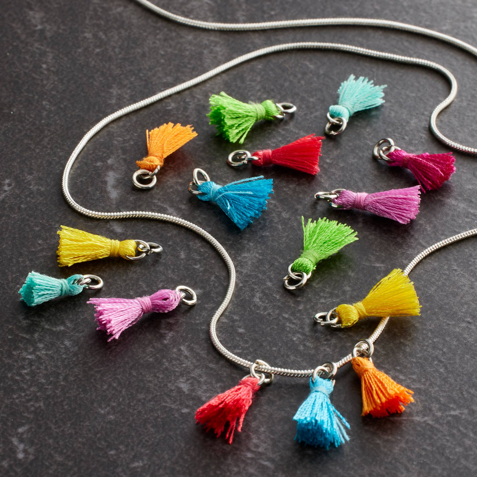 12 Packs: 16 ct. (192 total) Charmalong™ Rhodium Tassel Charms by Bead Landing™